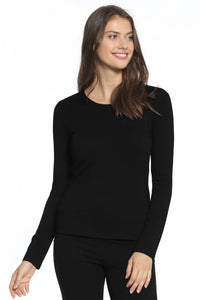 Woman wearing black long sleeve Pima cotton loungewear top and bottoms