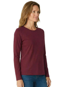 Woman wearing a long sleeve Bordeaux Pima cotton lounge top with blue jeans