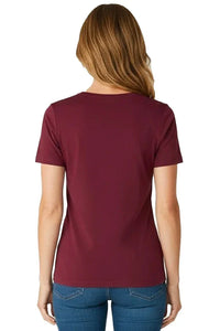 Back view of woman in a burgundy Pima cotton short sleeve tee and blue jeans