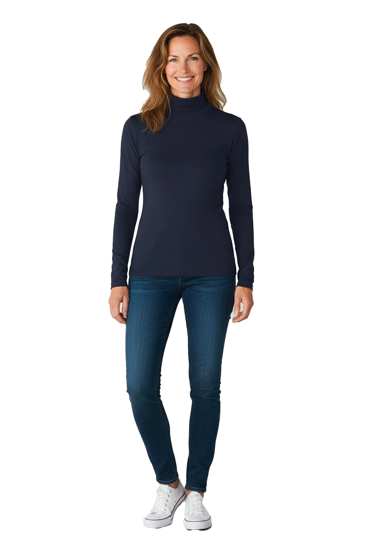 Woman wearing a navy turtleneck t-shirt, blue jeans, and white sneakers on a white background