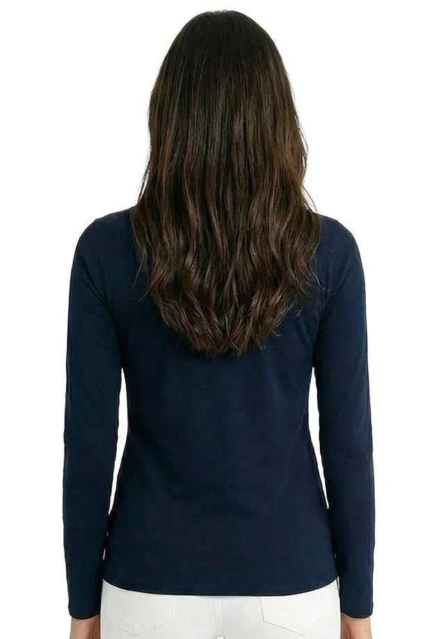 Woman in navy long sleeve loungewear top and white pants, back view, relaxed fit