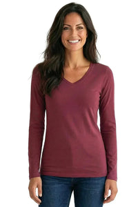 Woman wearing a long sleeve maroon Pima cotton loungewear top and blue jeans