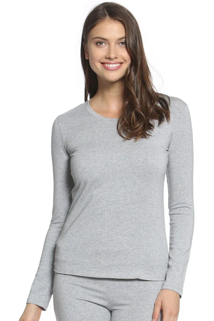 Woman wearing heather gray long sleeve Pima cotton loungewear set, smiling