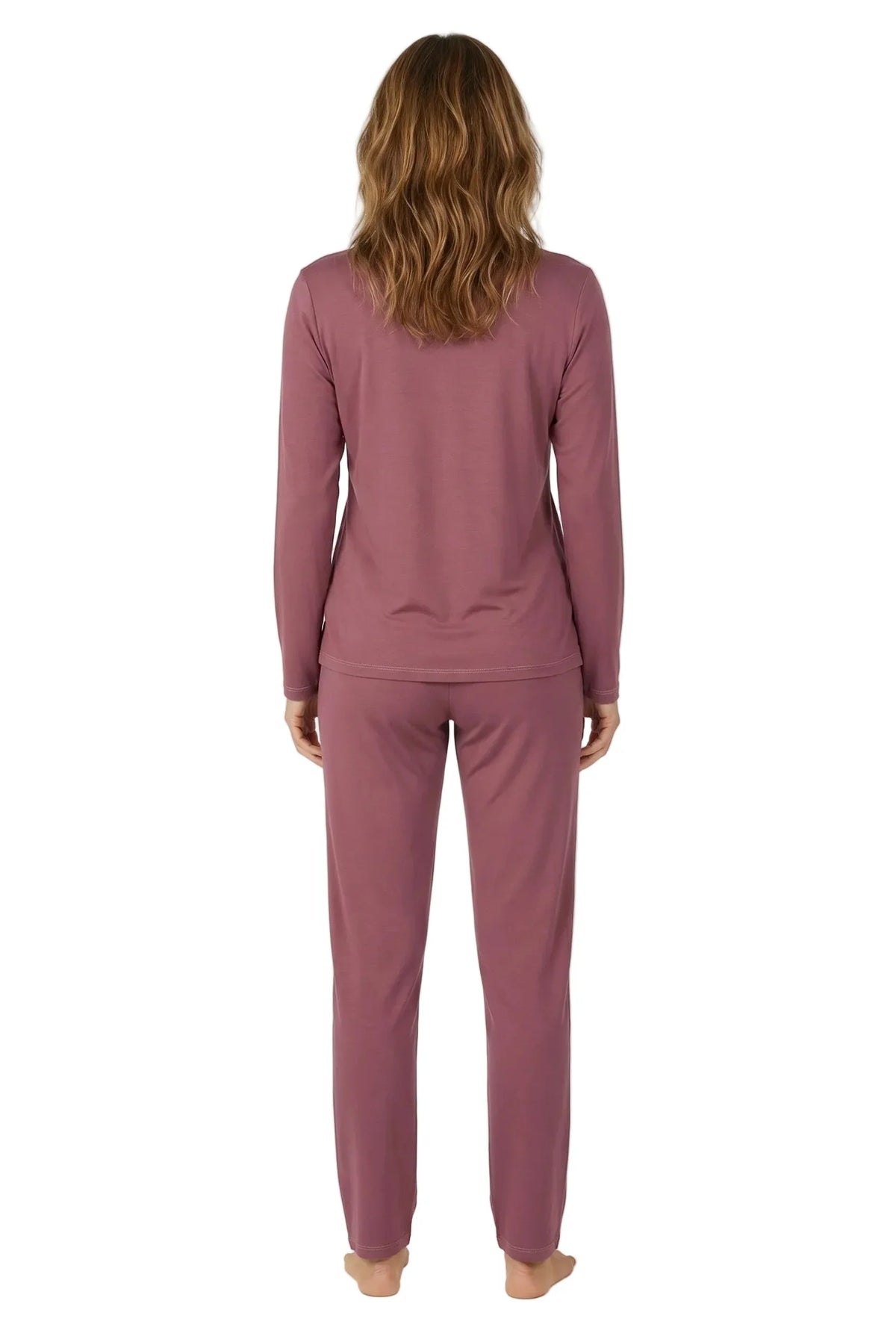 Woman wearing rosewood pink long-sleeve loungewear pajama set, viewed from back