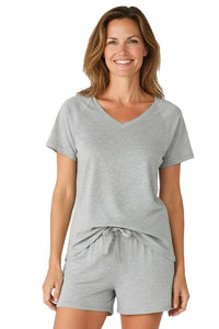 Woman wearing heather gray short sleeve loungewear sleepwear set with v-neck and drawstring shorts