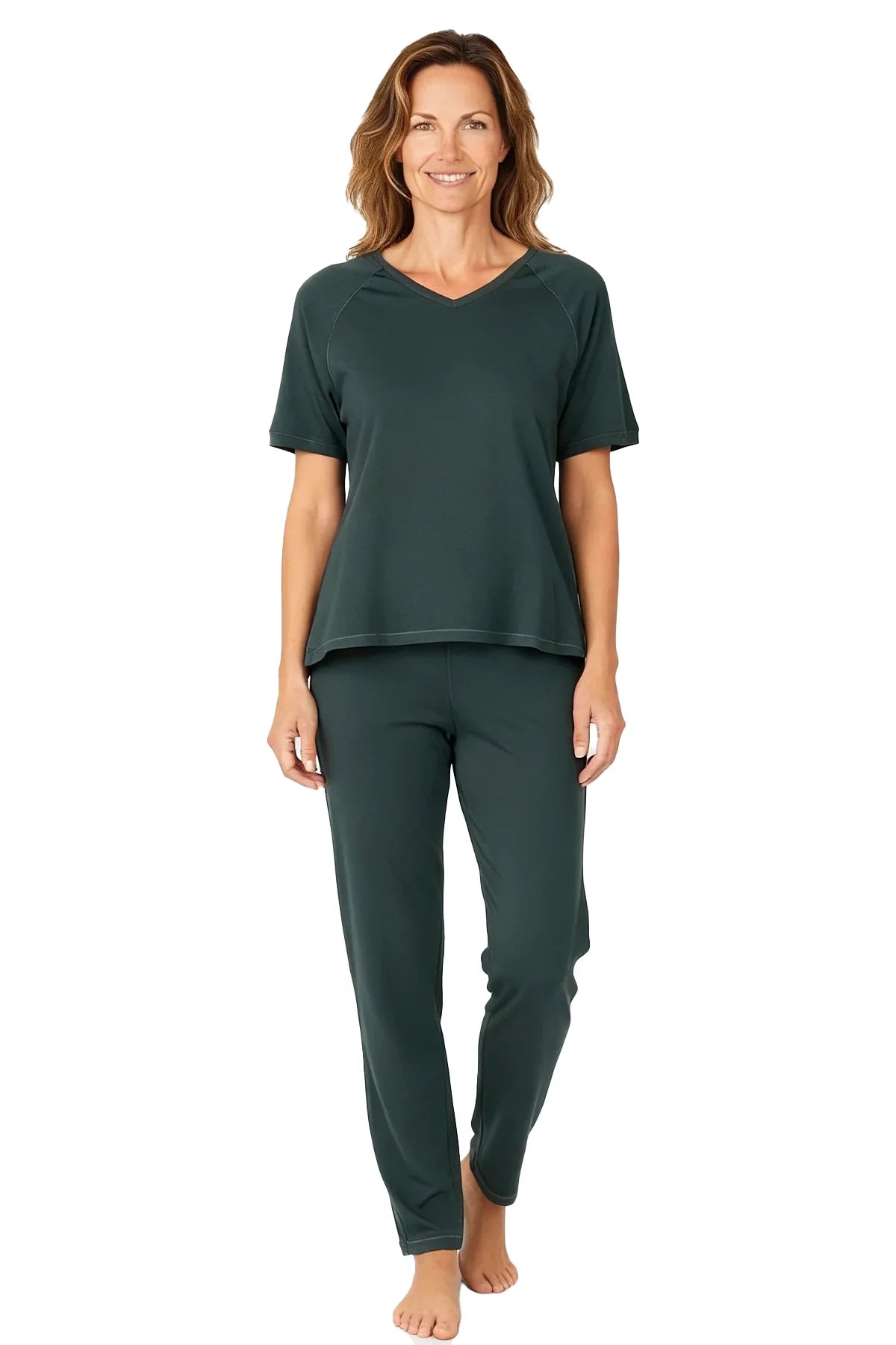 Woman wearing dark green Pima cotton loungewear set with short sleeves and pants