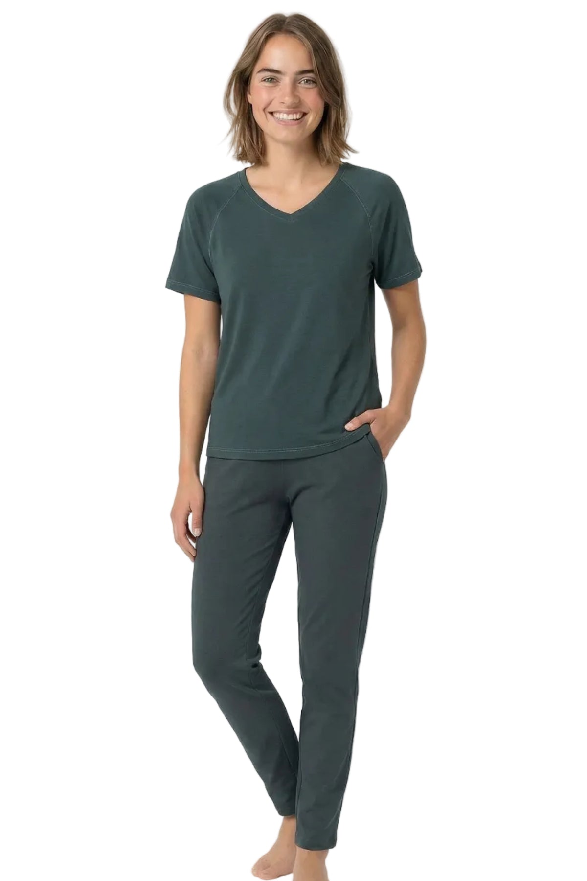 Woman wearing dark green Pima cotton loungewear set with short sleeve tee and pants