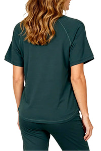 Woman wearing dark green Pima cotton loungewear set, back view