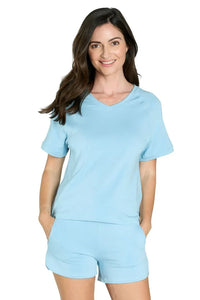 Woman wearing light blue short sleeve Pima cotton loungewear sleep set with V-neck top