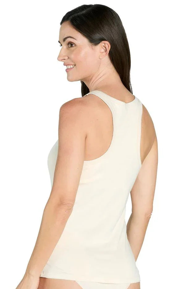 Woman wearing almond-colored Pima cotton racerback tank top and matching underwear