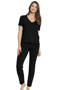 Woman wearing black Pima cotton loungewear set with short sleeve top and pants