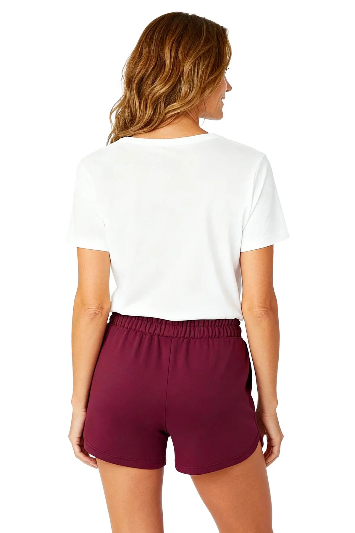 Woman in white tee and burgundy Pima cotton lounge shorts, back view, relaxed fit