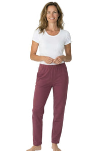 Woman wearing white short sleeve tee and rosewood Pima cotton loungewear pants