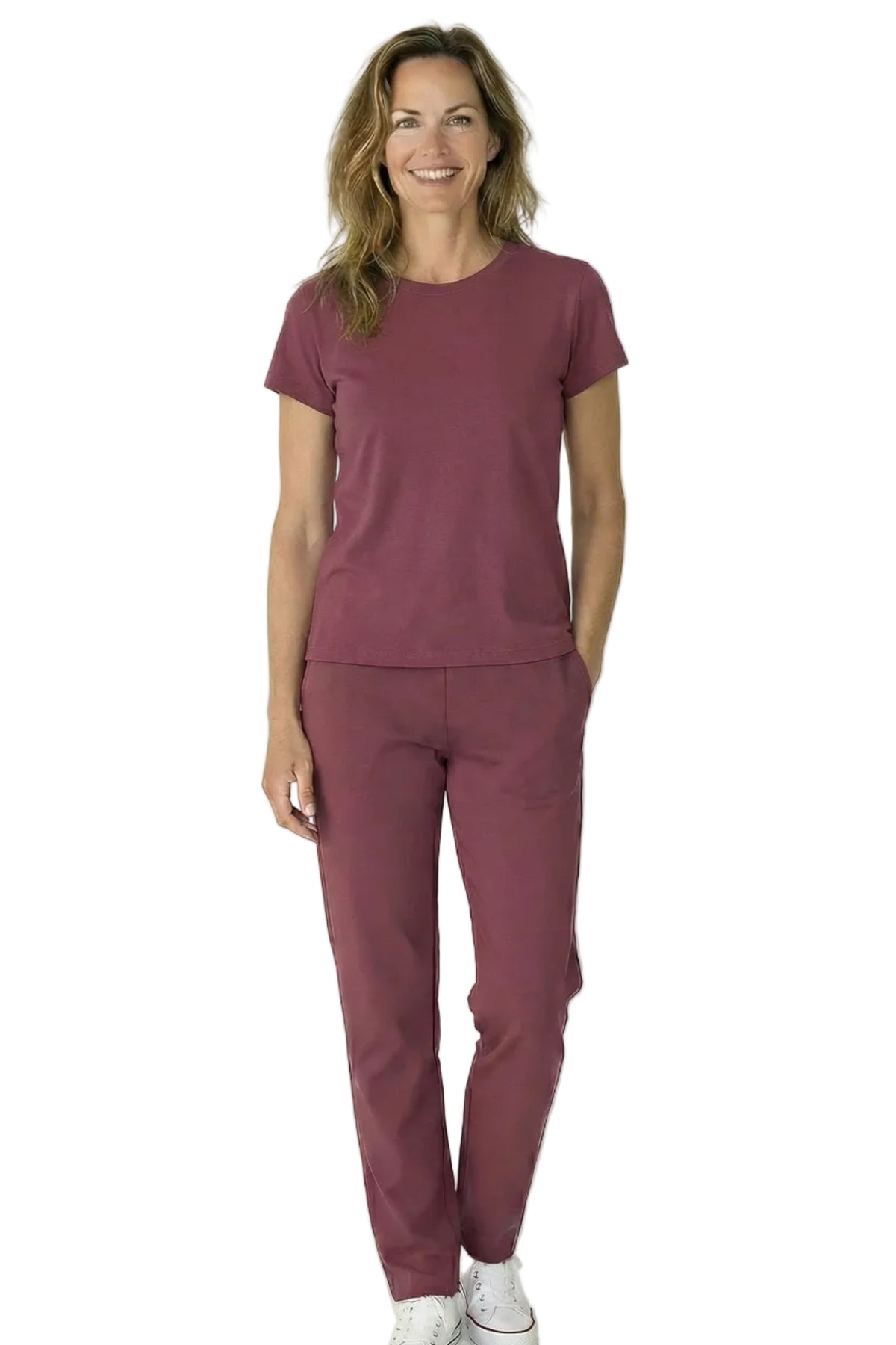 Woman wearing rosewood Pima cotton loungewear set with short sleeve top and pants