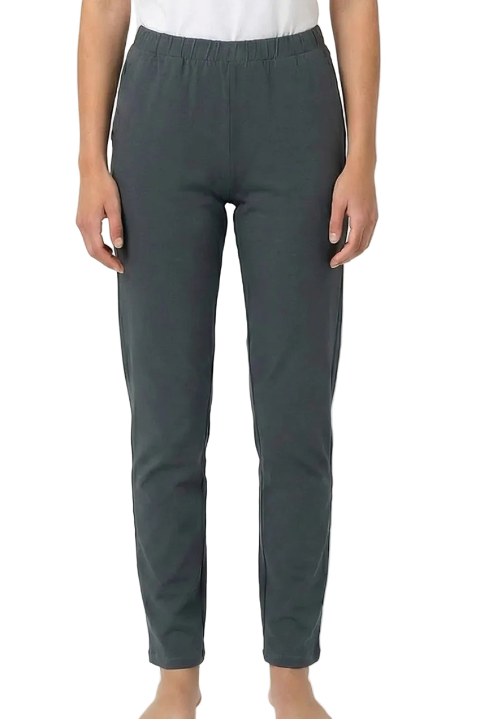 Woman wearing dark grey cotton lounge pants with elastic waistband, front view