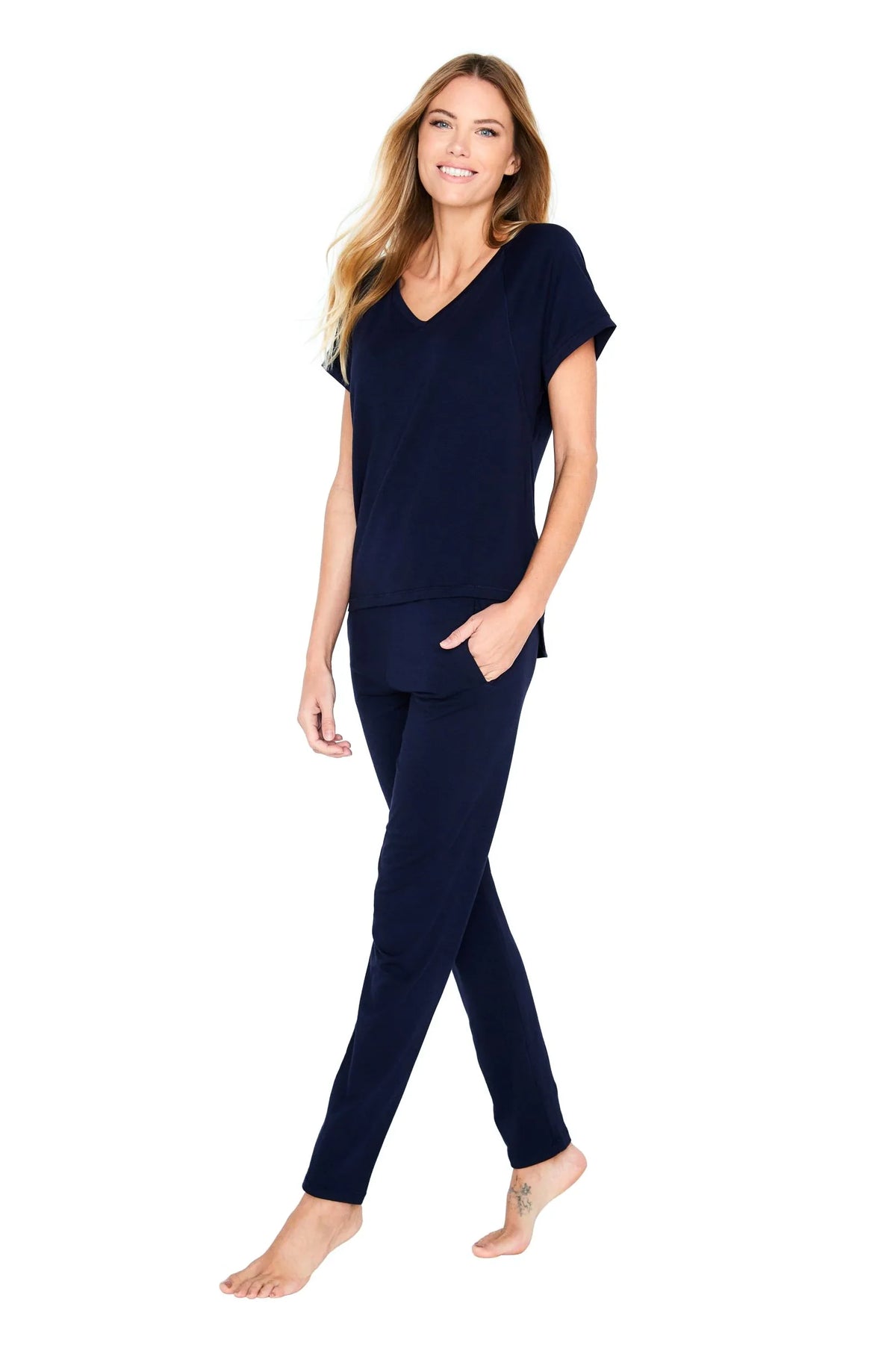 Woman wearing midnight blue Pima cotton loungewear sleepwear set on white background