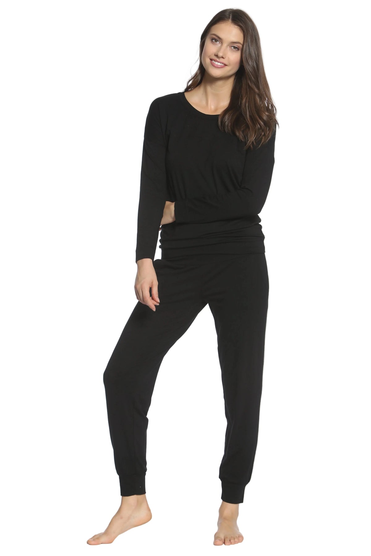 Woman wearing black long sleeve Pima cotton loungewear sleepwear set on white background