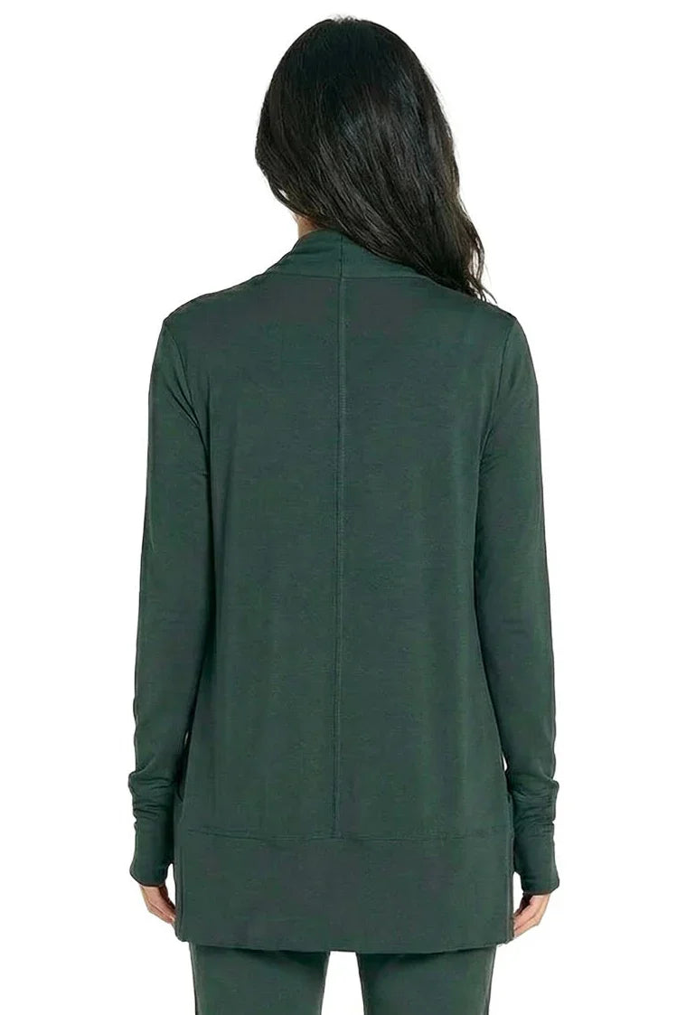 Woman wearing dark green long sleeve pima cotton loungewear top and pants, back view