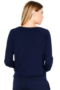 Back view of woman wearing midnight blue long sleeve Pima cotton loungewear top