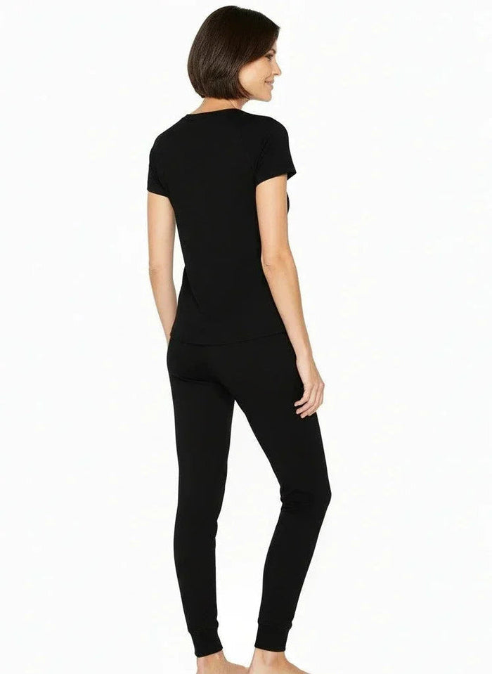 Woman wearing black Pima cotton loungewear set with short sleeve top and jogger pants