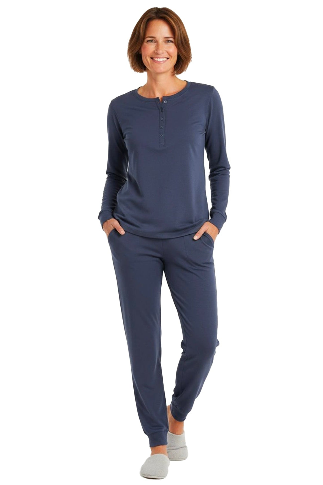 Woman wearing a long sleeve  steel blue loungewear set on a white 