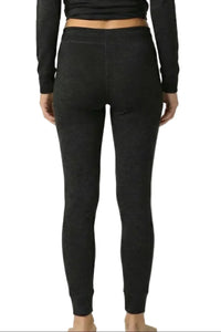 Back view of black women's loungewear leggings with elastic waistband and fitted cuffs