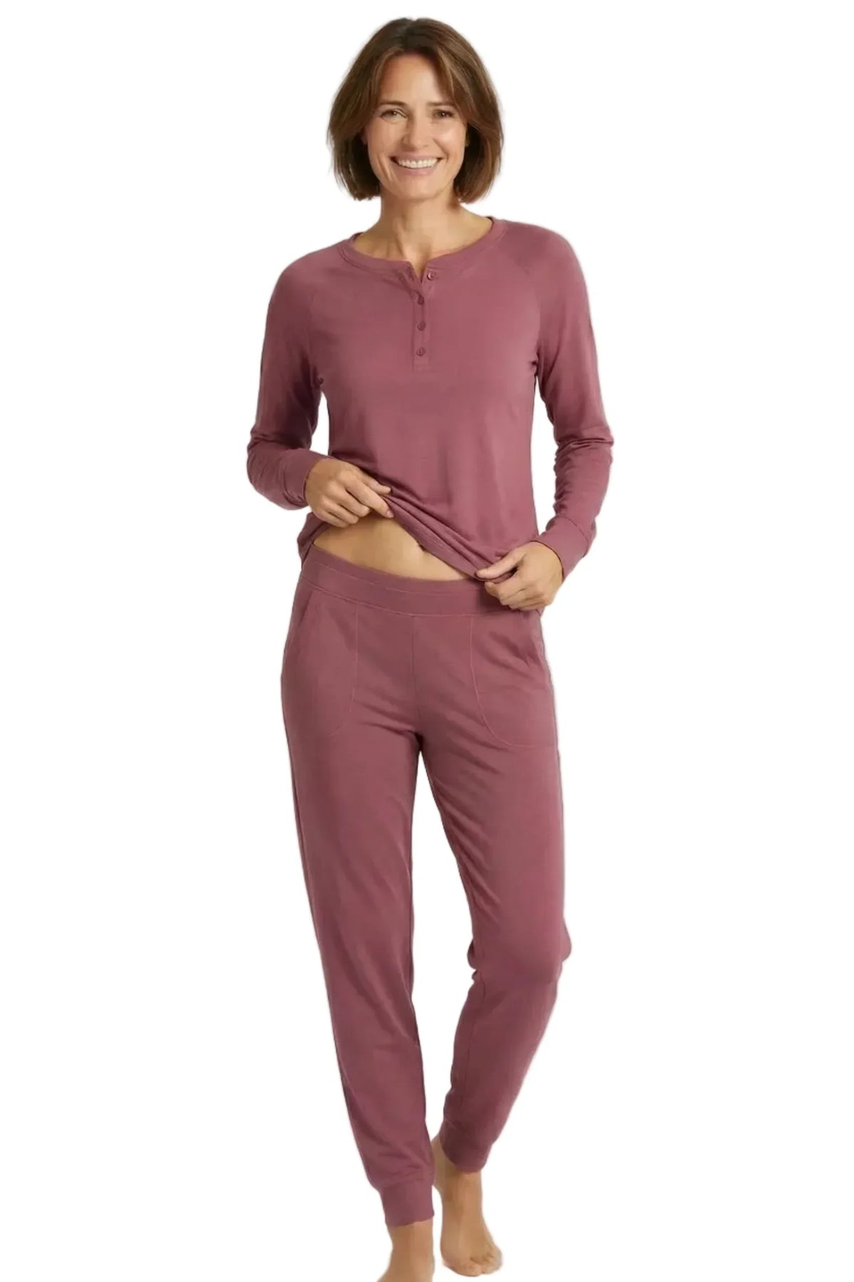 Woman wearing rosewood pink long sleeve Pima cotton loungewear pajama set