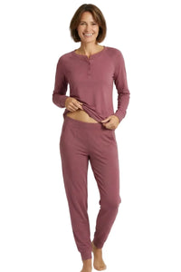 Woman wearing rosewood pink long sleeve Pima cotton loungewear pajama set