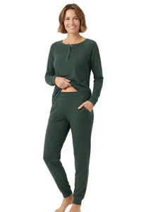Woman wearing dark green long sleeve Pima cotton loungewear sleepwear set