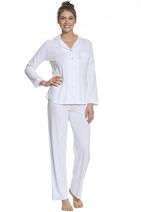 Woman wearing white Pima cotton long sleeve pajama set, relaxed fit loungewear