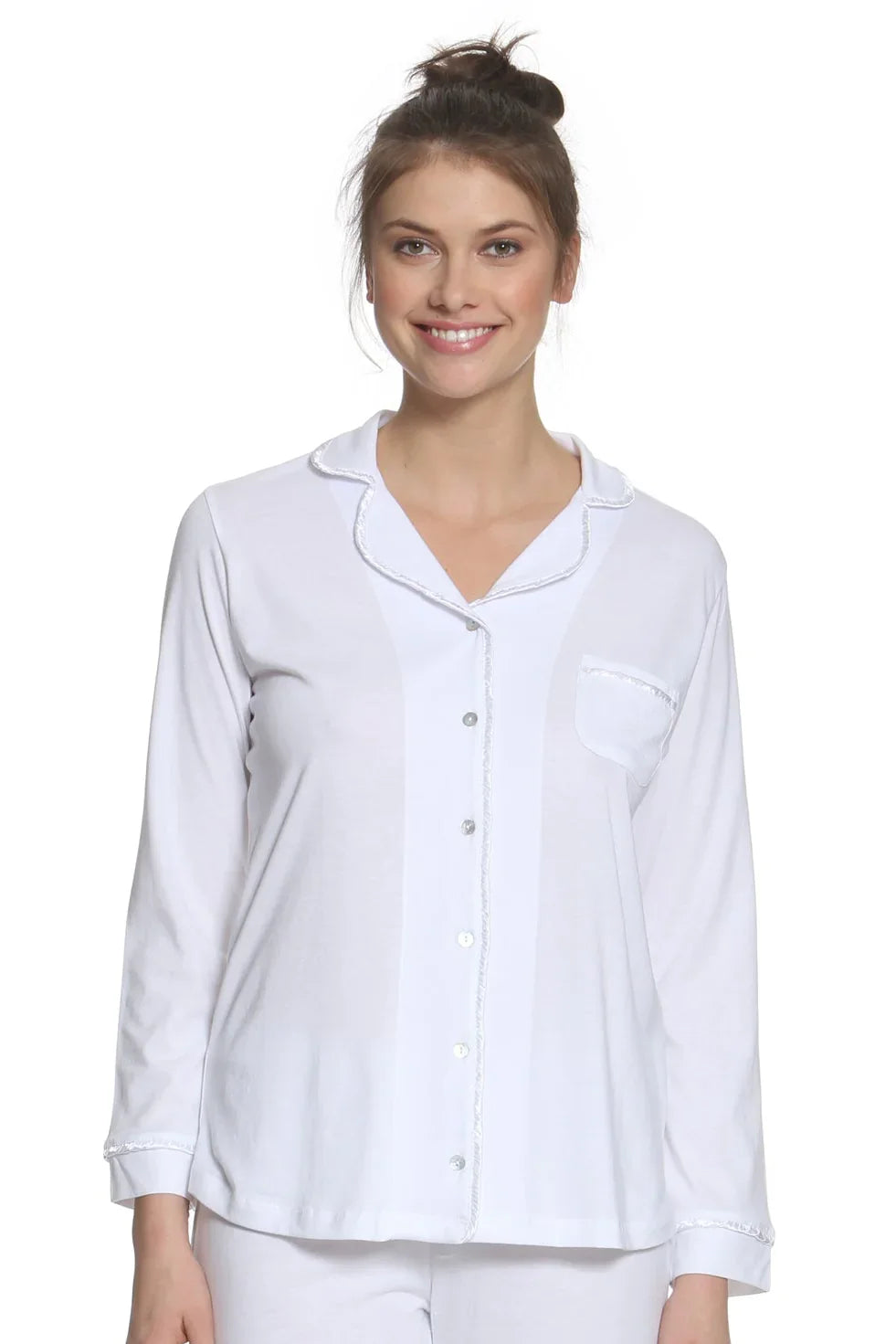 Woman wearing white long sleeve Pima cotton pajama top with button front and pocket
