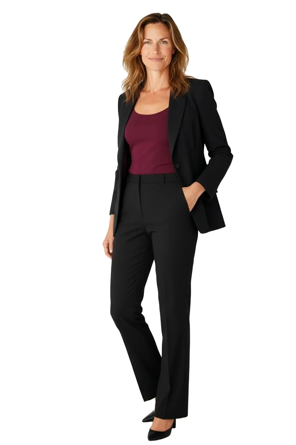 Woman wearing black blazer and pants with maroon sleeveless top and black heels on white background