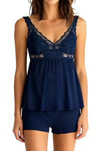 Woman wearing indigo navy lace trim sleeveless camisole top and matching shorts pajamas set