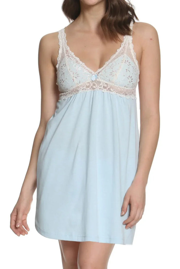Woman wearing light blue lace-trimmed sleeveless nightdress with floral details